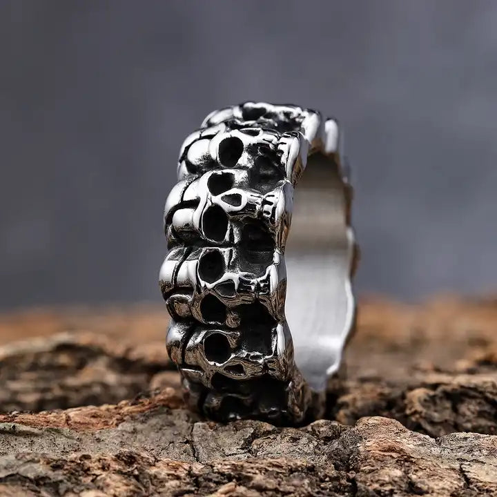 solid back multi skull band ring