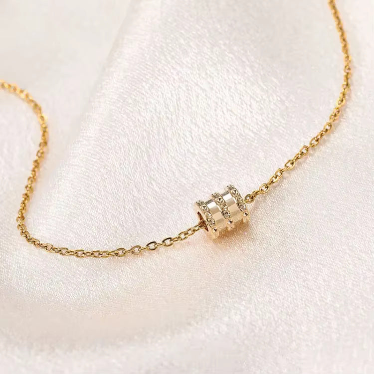 Miniature Gold Pendants