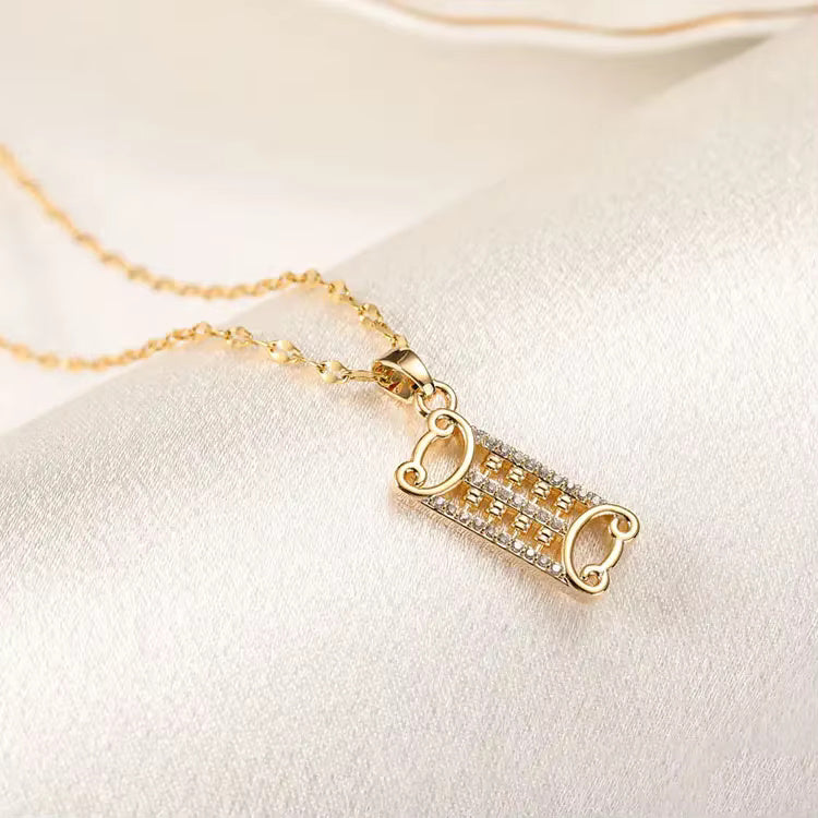 Miniature Gold Pendants