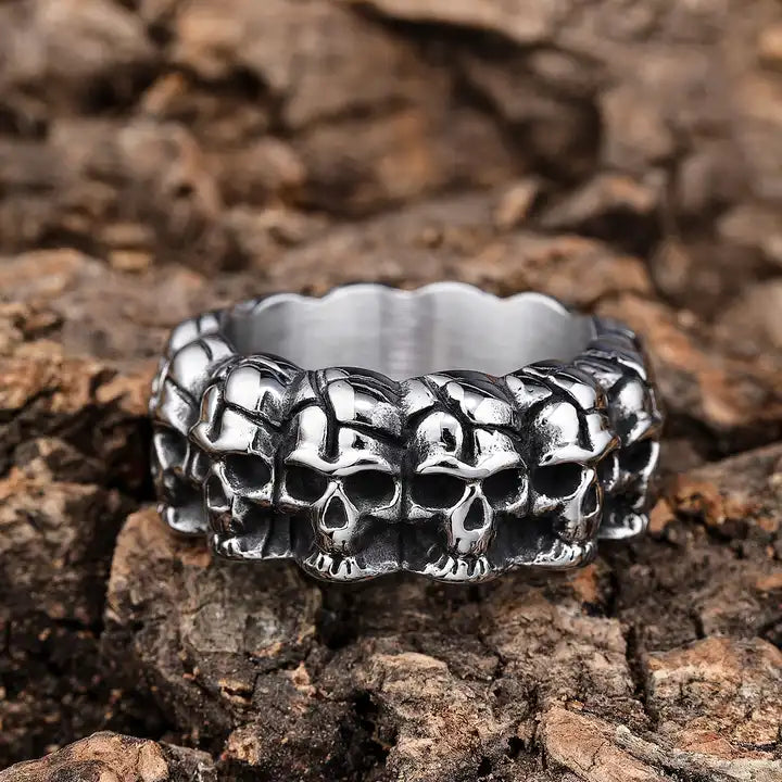 solid back multi skull band ring