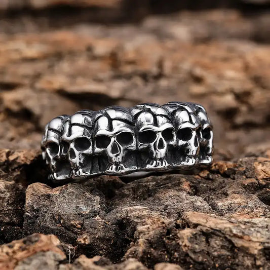 solid back multi skull band ring