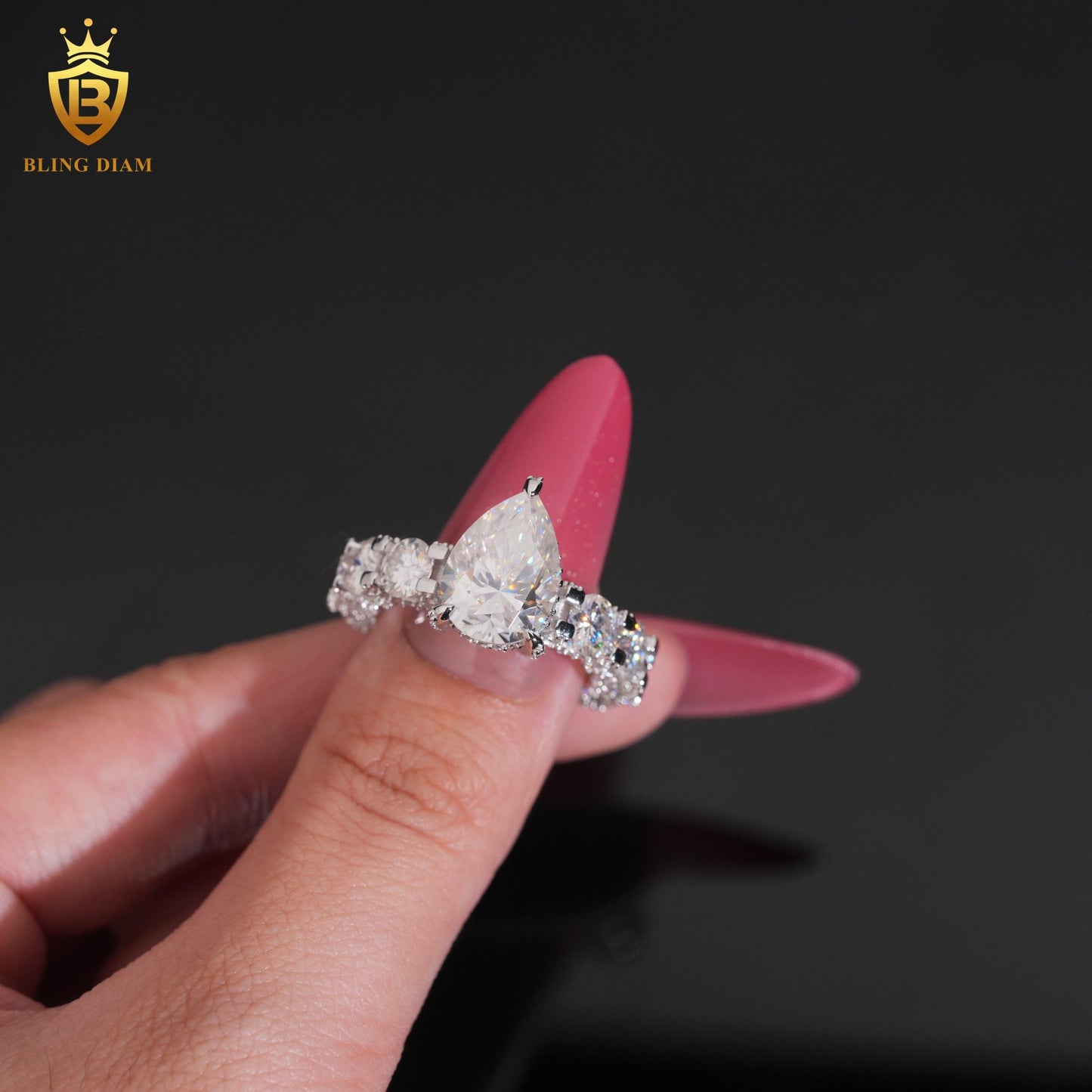 Pear-cut eternity moissanite ring