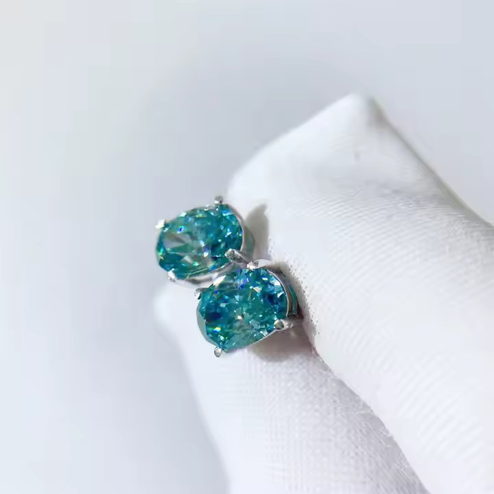 Oval Cut Green Moissanite Stud Earrings
