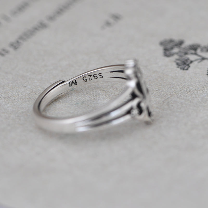 Cross Opening Ring