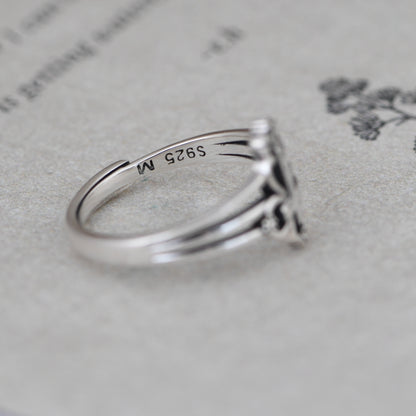 Cross Opening Ring