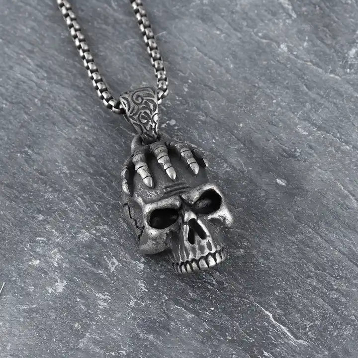 hands skeleton holding head skull Necklace