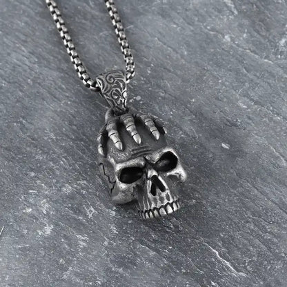hands skeleton holding head skull Necklace